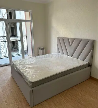 Grey upholstered bed frame