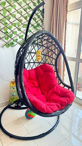Hanging egg chair with stand and red cushion for sale