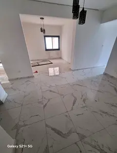 Apartment suitable for bachelors in Al Musalla – Sharjah 3 bedrooms and hall with 2 bathrooms and 