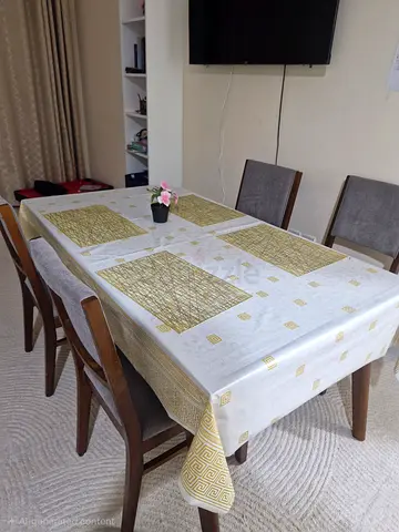 Elegant Dining Set with Stylish Table and Chairs