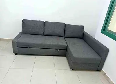 My grey L-shaped corner sofa bed with storage (good condition)