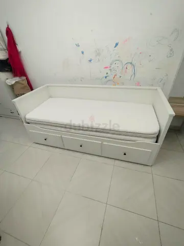 IKEA hamnes day bed with 3 big storage drawers underneath and with 2 IKEA mattresses is available