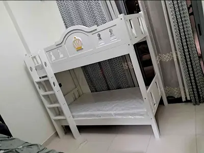 White wooden kids bunk bed with ladder (twin over twin)
