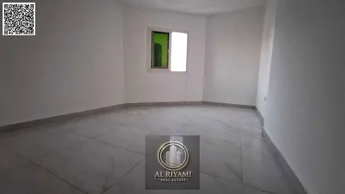 Two bedrooms and a living room, annual rent in Al Rashidiya 3, behind the mall, surrounded by all services.