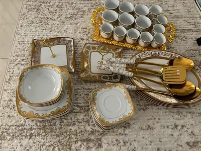 Elegant Dinnerware Set with Gold Accents