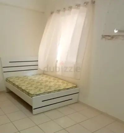 Spacious partition with window in karama ready to move