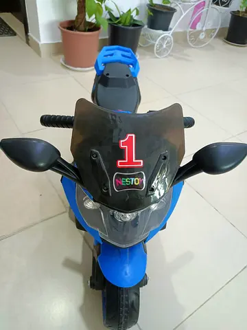 Kids Blue Ride-On Motorbike - Need to change battery since current battery required regular charge