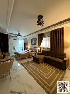 Furnished studio apartment with hotel-style furnishings for monthly rent in Ajman - Al Tallah - oppo