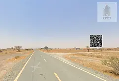 A prime opportunity to purchase two adjacent residential/commercial plots of land in Masfout 1, stra