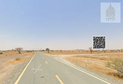 A prime opportunity to purchase two adjacent residential/commercial plots of land in Masfout 1, strategically located opposite the services area.
