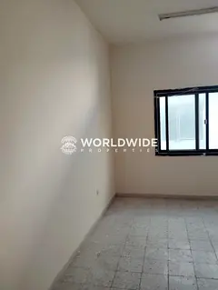 Spacious 12 Unfurnished Labor Rooms for Rent | Prime Location in Al Jurf 1 – Ajman