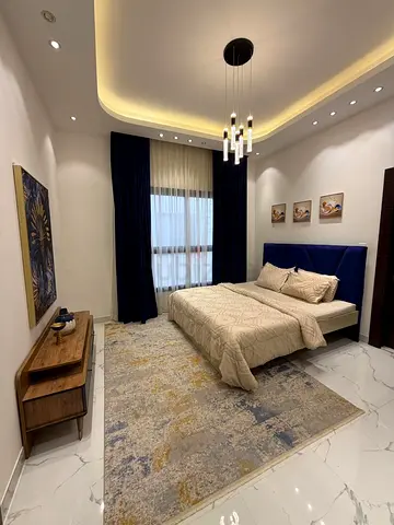 Elegant Bedroom Set with Modern Rug