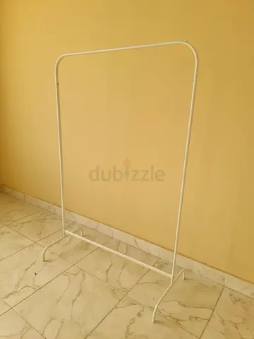 White freestanding clothes rack - lightweight metal frame