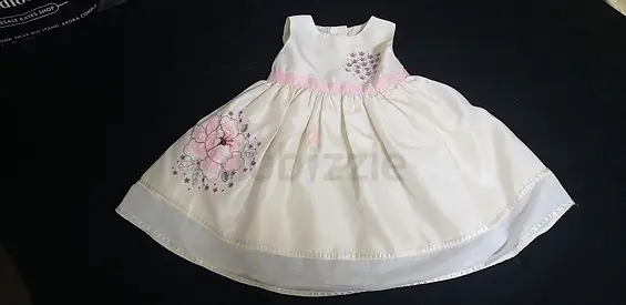 White embroidered baby dress with pink trim - gently used
