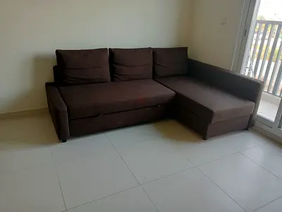 Brown L-shaped sectional sofa with right chaise - good condition