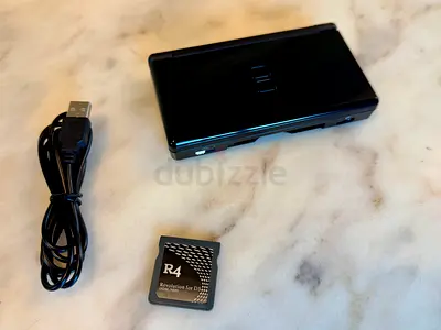 Used Black Nintendo DS Lite with R4 Card  charging cable