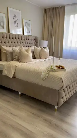 My beige tufted upholstered bed frame with headboard