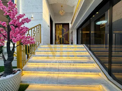 Stunning villa for sale, 5000 sq ft, including water, electricity, and air conditioning - Ajman, main street, freehold, open to all nationalities