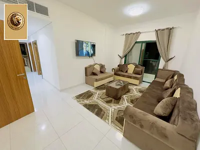 Two bedrooms and a living room in Al Rashidiya 2