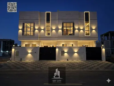 Modern stone facade townhouse villa for sale in Al Bahia – Ajman. Freehold ownership | Bank financing or cash | Registration fees included
