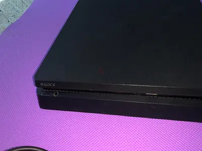My Sony PS4 Slim (Black) - perfect conditions with 6 Games and 2 controllers