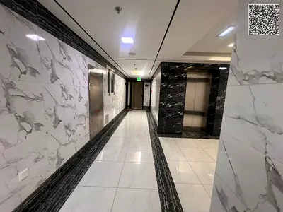 Spacious Modern Apartment Featuring Two Bedrooms Living Hall Three Bathrooms and a Balcony with an Attractive View and Prime Location