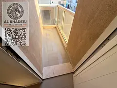 A spacious one-bedroom apartment with a balcony and open views in the Al-Aliya area, near Mohammed B