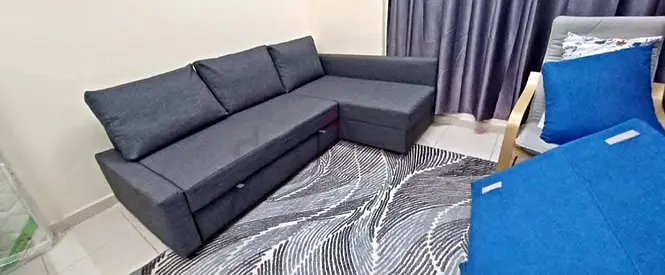 My gray L-shaped sectional sofa bed good condition