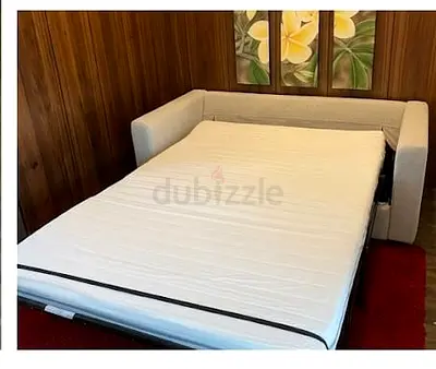 My light grey fabric 2 seater sofa bed - pull-out double, good condition