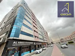 Building for sale in the Muwailih commercial area, directly on Maliha Street, with an annual return