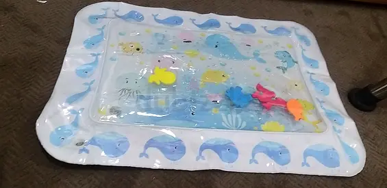 Baby water play mat for tummy time — gently used