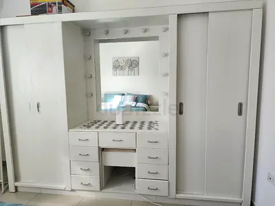 My White Sliding Wardrobe with Built-in Vanity  Lighted Mirror