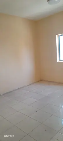 1bhk hall @35k neat and cleaned building closed to Al Nahda park