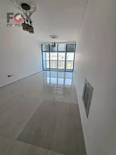 Spacious 2BR apartment for annual rent in Al Nuaimiya 3 Ajman, open-view balcony, free parking, qual
