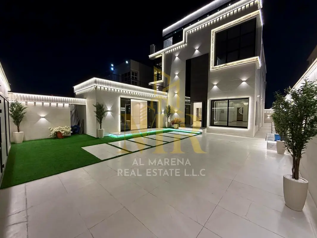 Stunning villa for sale, 5000 sq ft, including water, electricity, and air conditioning - Ajman, main street, freehold, open to all nationalities