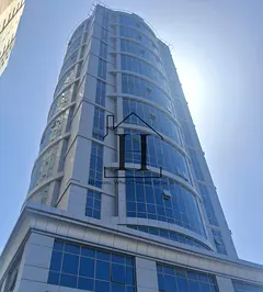 Corner Ground level l In a Residential &amp; Commercial Tower l Near RAK MALL l Chiller-Free l Ample