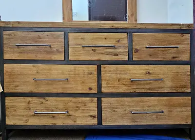 Dresser with 2 small tables and another table with drawers to hold clothes