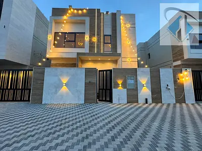A modern villa with high-end finishes, 4 bedrooms, spacious living areas, freehold ownership, and a monthly installment of 6500 dirhams is for sale at