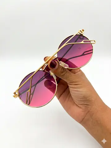 Round gold Cartier sunglass — gently used, dark lenses