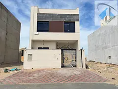 A modern villa with high-end finishes, 4 bedrooms, spacious living areas, freehold ownership, and a