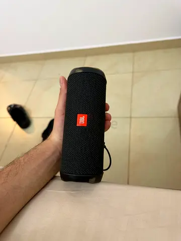 My black JBL Flip Bluetooth portable speaker — working condition