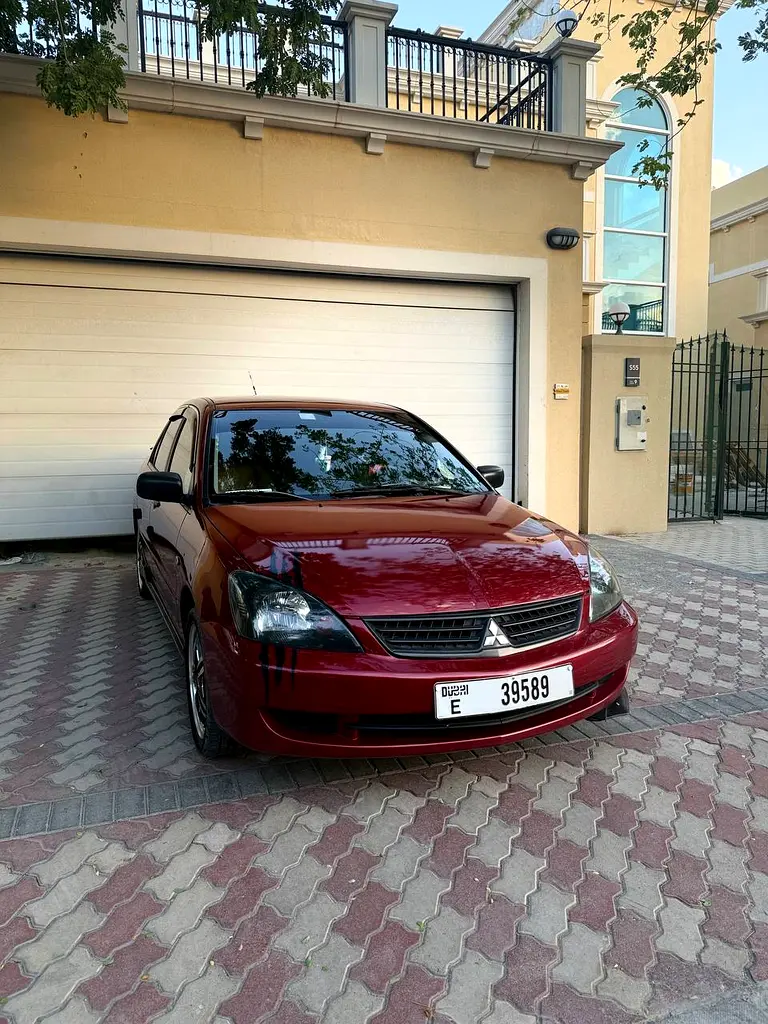 Mitsubishi Lancer 2010 — photo 1 of 7