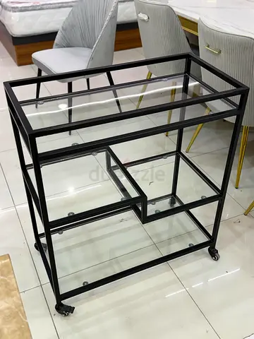 Glass and Black Metal Bar Cart on Wheels