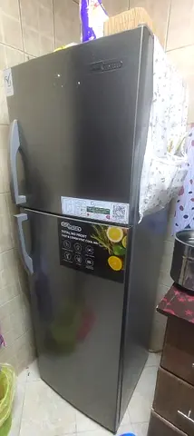 My stainless steel 2-door fridge (top freezer) - good working condition