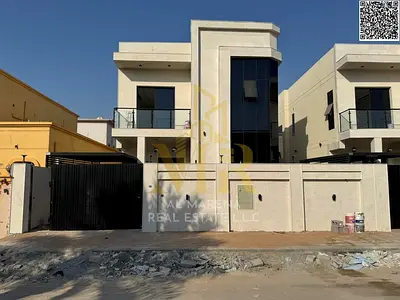 Villa for sale in Al Muwaihat 1 area, behind Nesto, price includes electricity, water, and air conditioning. Freehold ownership for all nationalities.