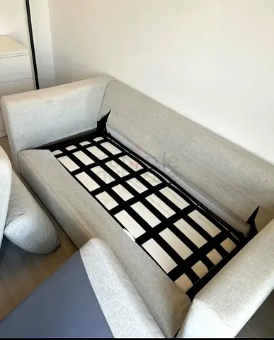 Light grey 3-seater sofa bed — fold-out sleeper, good condition