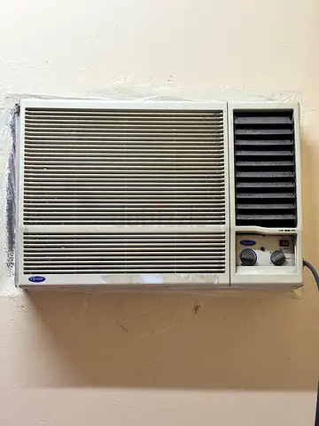Almost new used window AC for sale Carrier