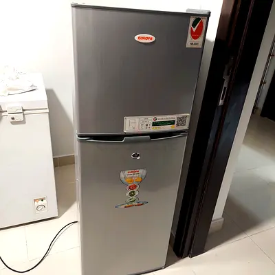 Silver Refrigerator/freezer with key for Sale like new kept in guest room