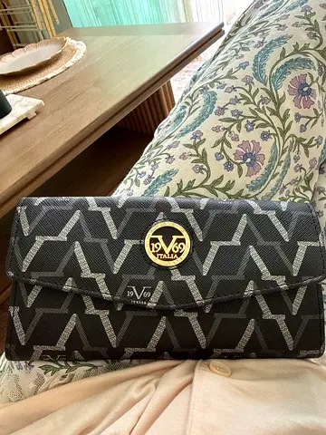 My black patterned fold-over womens wallet/clutch - lightly used