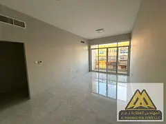 2-Bedroom Hall Apartment for Rent – Al Rawda 3, Ajman | 3 Bathrooms, Balcony, Central AC, Near She
